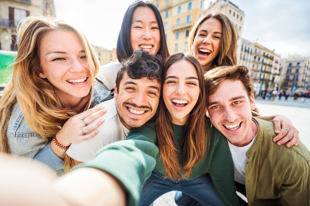 Confident smiles with dental implants in the Scotts Valley, CA community Group of friends smiling together, representing the confidence of natural-looking dental implants in the Scotts Valley, CA community